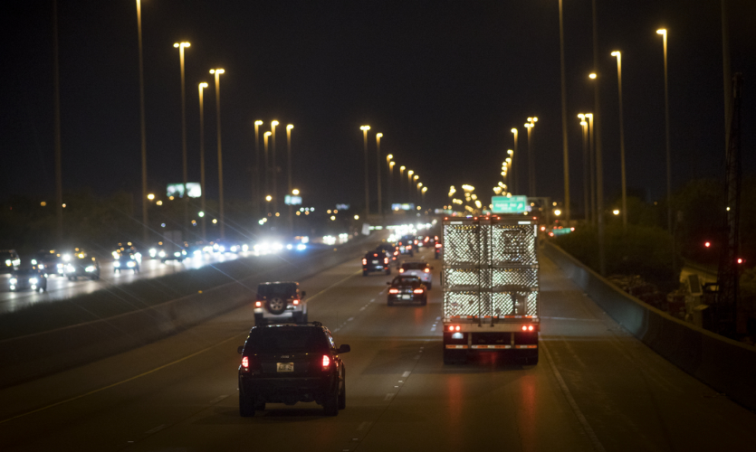 semi truck driving at night