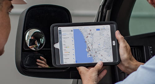 tablet with fleet tracking map on screen